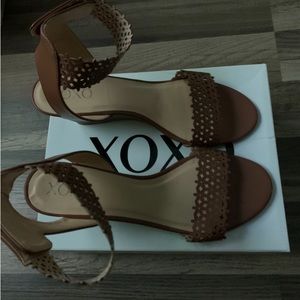 Light brown ankle strap wedge heel shoe they are new.
